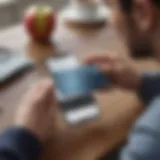 Cardholder managing their Apple Card account on a smartphone