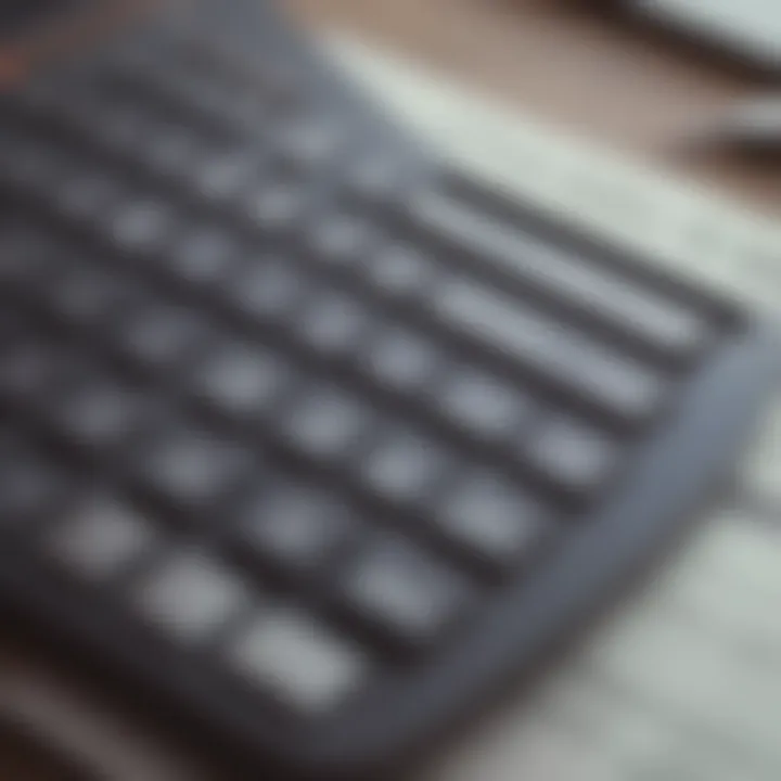 Close-up of a calculator displaying financial calculations